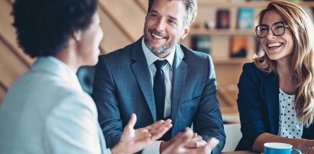 Business persons talking in the office