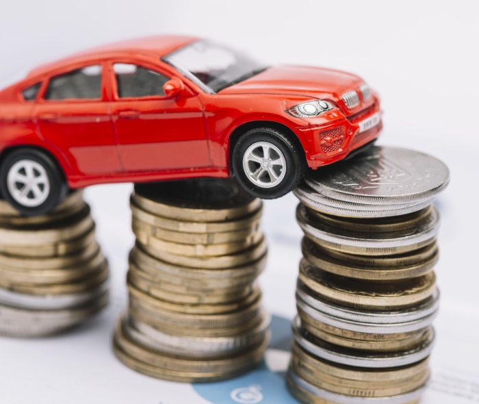 small-red-car-stack-increasing-coins (1)